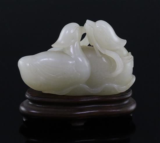 A good Chinese white jade group of two mandarin ducks biting lotus tendrils, 18th/19th century, L. 7.2cm